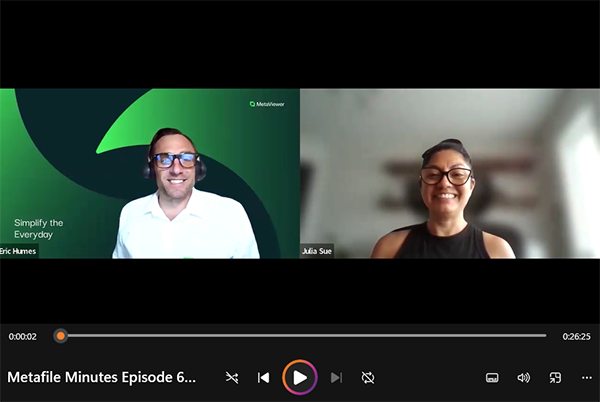 Two people smiling during a virtual meeting on Metafile Minutes Episode 6 video call.